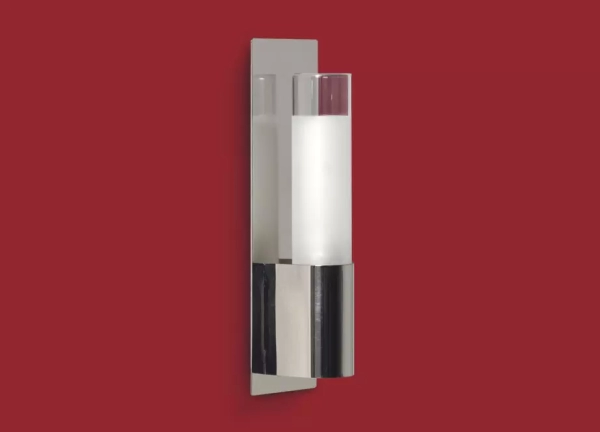El aplique Punto es un artefacto de aplicar fabricado en metal de estilo clásico. Está disponible en color cromo o blanco.