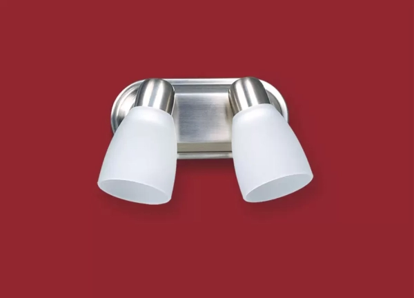 El aplique Pepa doble es un artefacto de aplicar fabricado en metal de estilo clásico. Esta disponible en color blanco o acero.
