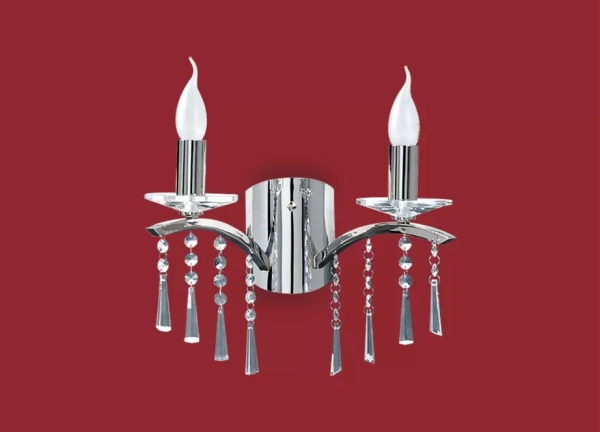 El aplique Salomé es un artefacto de aplicar fabricado en metal de estilo colonial de una o dos luces, el mismo está disponible en color cromo o bronce