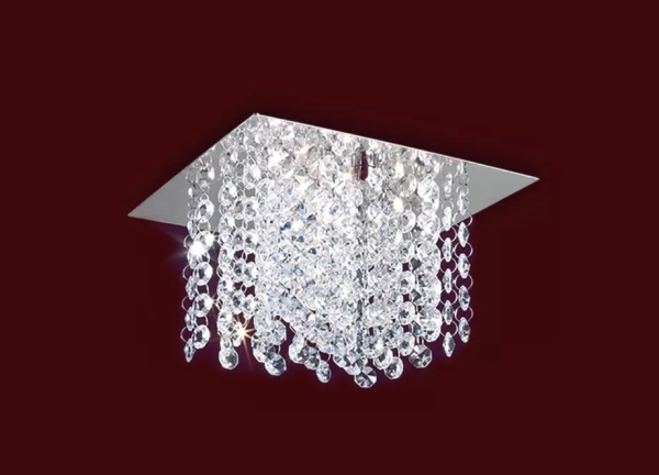 El plafón Tina es una lámpara de una, dos o cuatro luces apto LED, disponible en color cromo con decoración de strass