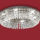 El plafón Patagonia es una lámpara de seis luces apto LED, disponible en color cromo con decoración de cristal.
