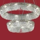 El colgante Patagonia Doble es una lámpara de 15 o 21 luces apto LED, disponible en color cromo con decoración de cristal.