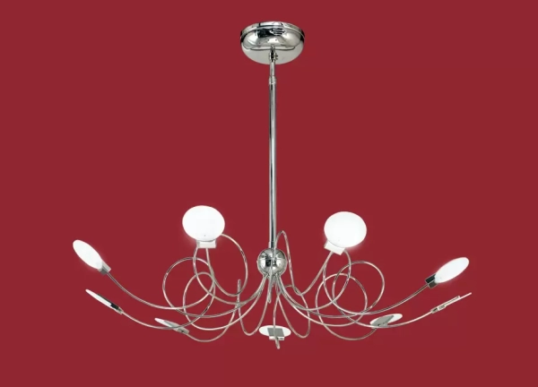 El colgante Misterio II es una lámpara de nueve luces apto LED, disponible en color cromo. Adaptable a todo tipo de ambiente.