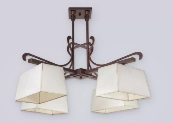 El colgante París es una lámpara de cuatro luces, estilo vintage, disponible en color marrón. Adaptable a todo tipo de ambiente.