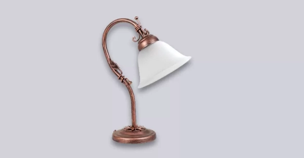 La lámpara Primavera es una lámpara de mesa de una luz apto LED, estilo vintage, disponible en color cobre. Adaptable a todo tipo de ambiente.