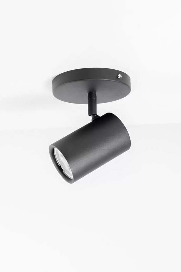 El cabezal Nikon es una luminaria de estilo industrial fabricada en hierro y pintura en polvo texturada. Diaponible en blanco o negro