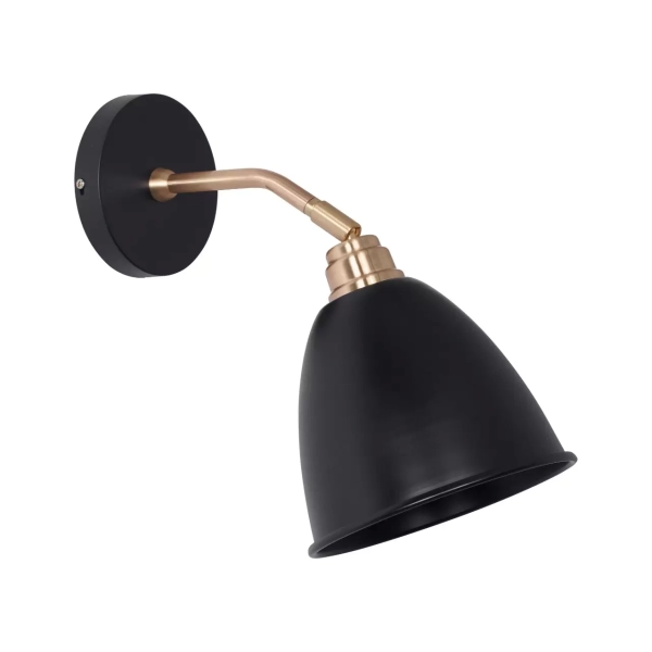 El aplique Rhode es una luminaria de estilo retro, fácil adaptable a todos los ambientes y disponible en los colores blanco o negro.