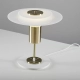Lámpara de mesa Orbit. Luminaria de techo fabricada en acrílico y hierro, de estilo moderno, con LED integrado y disponible en dos colores: bronce y plátil.