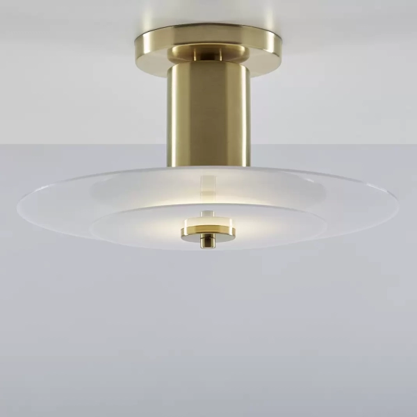 Plafón Orbit. Luminaria de techo fabricada en acrílico y hierro, de estilo moderno, con LED integrado y disponible en dos colores: bronce y plátil.